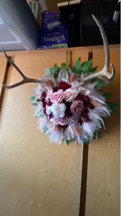Real Reindeer antlers w/faux florals hanging wall decor