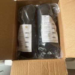 A PAIR OF MAXIMUS WRIST BRACES NEW IN BOX