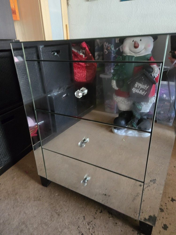 Beautiful mirror nightstand, brand new with a small corner dent