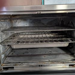 Toaster oven works great cleaned it so well it took the shine off