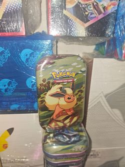 $35 Prismatic mini tin Flareon Pokemon TCG