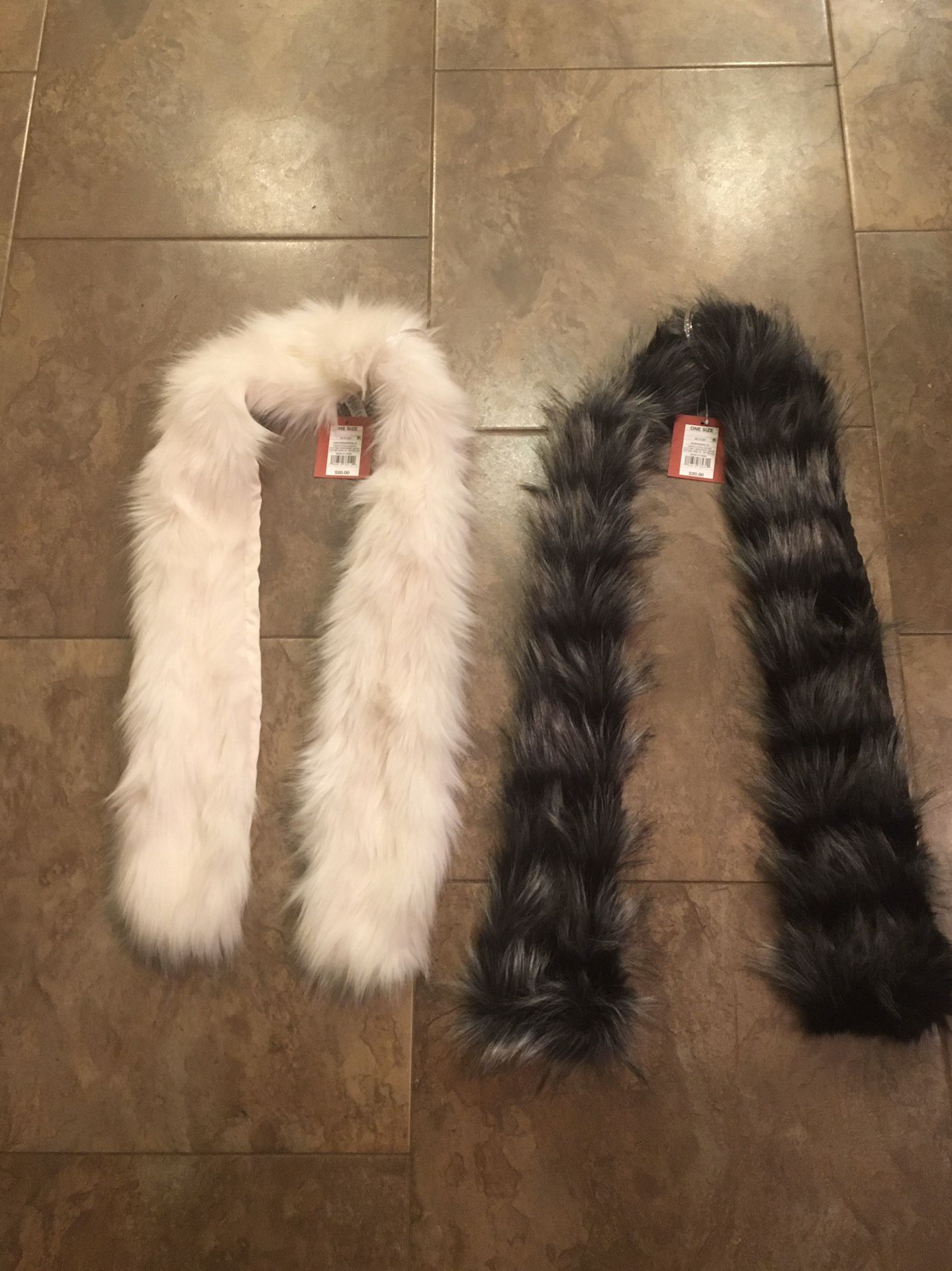 2 Faux Fur scarfs with tags. $10 each