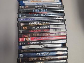 Large 28-piece DVD and Blu-ray movie collection being sold together as one lot.