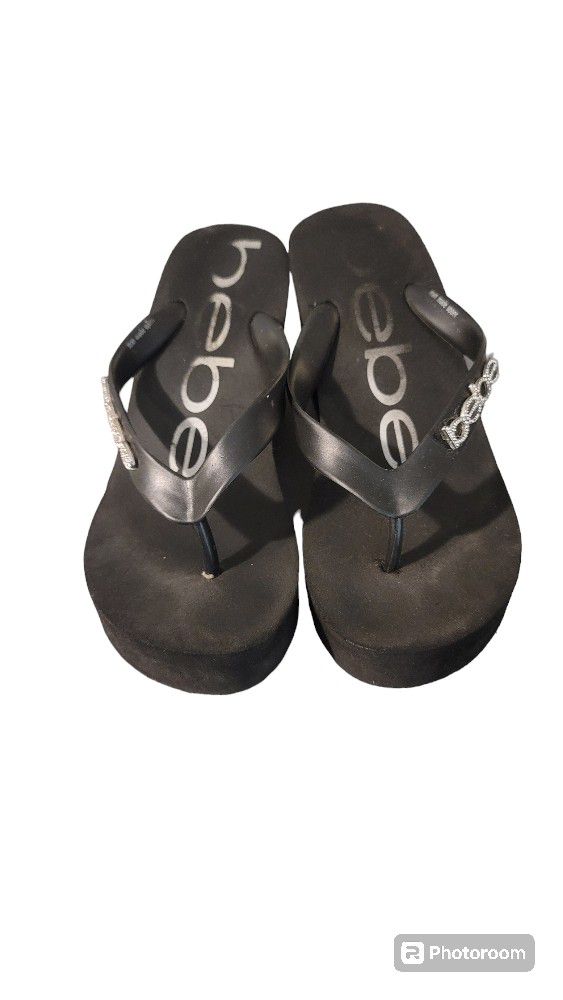 Bebe
Women's Black Kristy Wedge Flip Flop Sandals