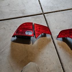 
Replacement 2006 Honda Civic - Driver and Passenger Side, Outer Halogen Tail Light, Without bulb(s), 4-Door, Sedan, Mounted On Luggage Lid, OE Replac