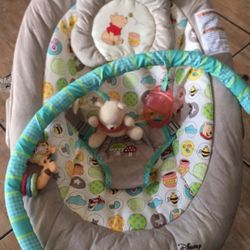 Disney Winnie the Pooh bouncer.