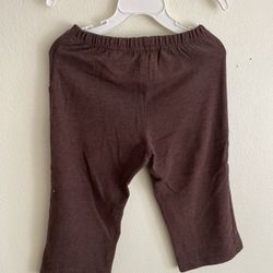 This is a children's casual pants (or sports pants). • Color and Material: Coffee color (dark brown), it is made of soft knitted cotton fabric, suitab