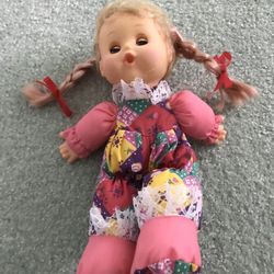 Vintage 10” doll With eyes that open and close.