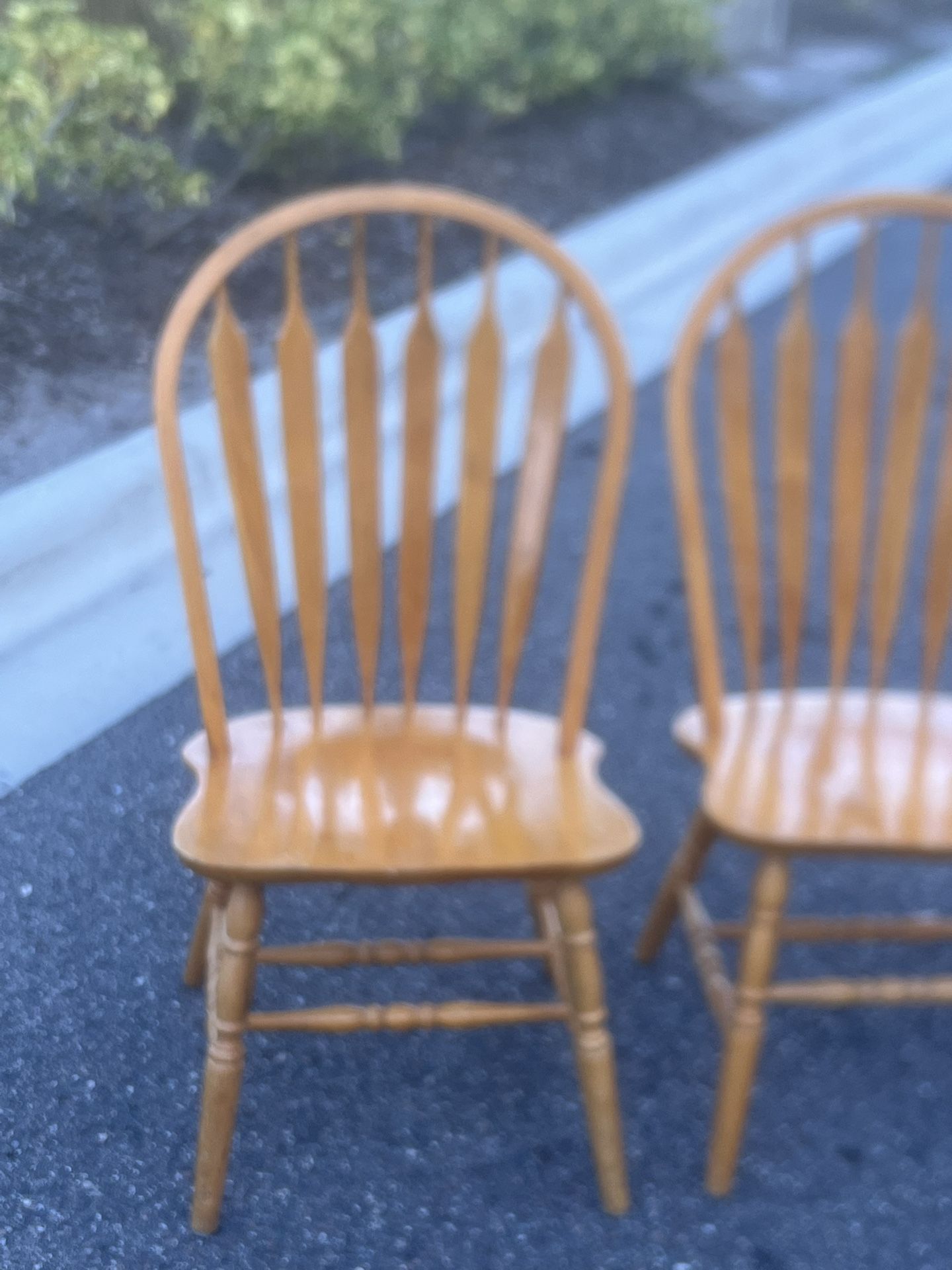 Wood chairs. Used in good condition with some cosmetic blemishes. There blemishes are in the form of scratches and scuff marks associated with normal 