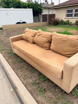 Tan Fabric Sofa with Throw Pillows