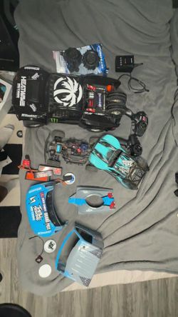 Rc cars Losi Baja ray and a Traxxas min slash
