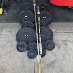 Olympic weight plates 260lbs plus 45lb bar and curl bar