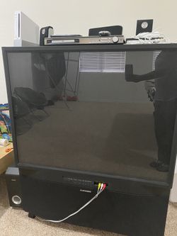 Box Huge Tv For Regular Watching And Gaming Along With Speakers