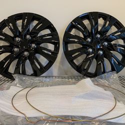 Two (2) Black 16 inch Hubcaps