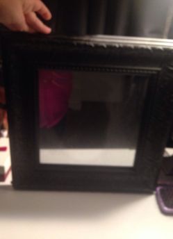 Small hang up mirror