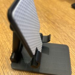 Foldable Phone Stand ( Phones Or iPads ).