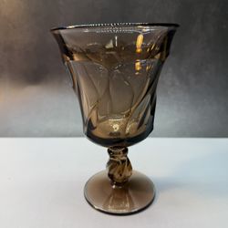 (1)  Fostoria Jamestown Water/Wine  Goblet Brown 5 7/8" Swirl Pattern.