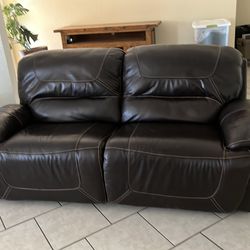 Leather couch and 2 chairs $400