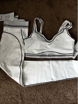 Brand new white alo set, with black lining