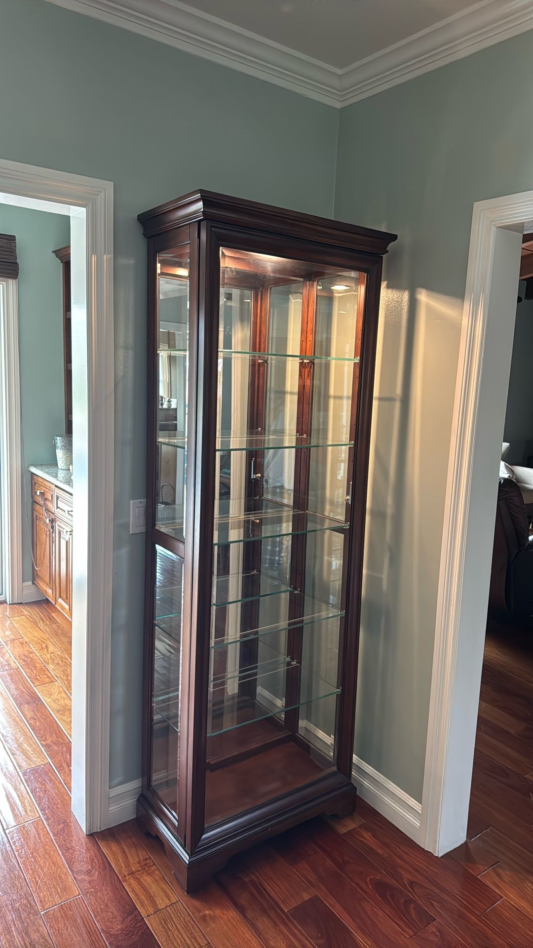 2 curio cabinets