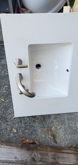 BATHROOM  SINK 31" X 22" $75 INCLUDE FAUCETS 