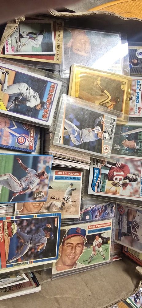 A Collection Of Baseball Football Basket Ball And  Magic