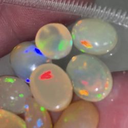 Genuine Opals, Good Flash Fire Rainbow Colors. Oval Cabochon 