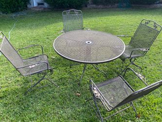 VINTAGE - WROUGHT IRON PATIO SET WITH TABLE AND 4 ROCKER CHAIRS