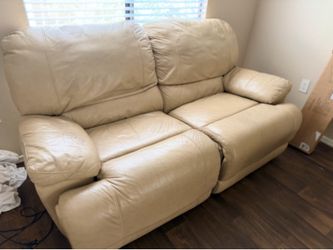 Cream leather power recliner love seat couch