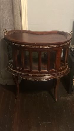 Vintage kidney shaped mahogany vitrine
