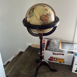 Globe on a stand , vintage