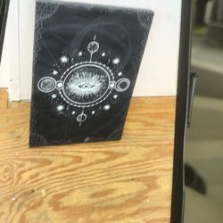 One eye occult framed art