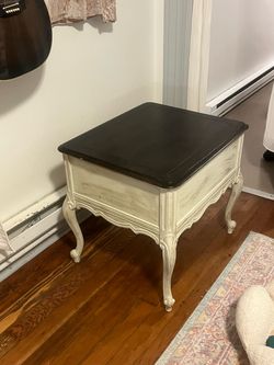 Short wooden bedside table