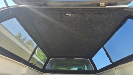 Snug top camper with keys