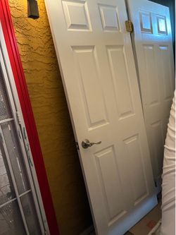 2 BEAUTIFUL WHITE DOORS SOLID WOOD $160 EACH AND ONE REGULAR DOOR FOR $40