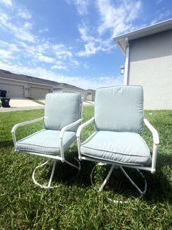 Selling a set of 6 swivel patio chairs.