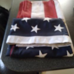   5 X  8. ALL POLIESTER MATIRAL. REENFORCED.  CORNERS.  REAL BIG  FLAG