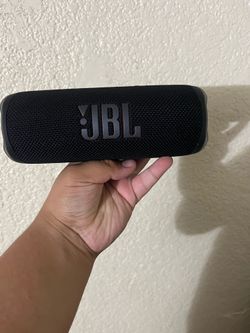 JBL speaker and AirPods 4s