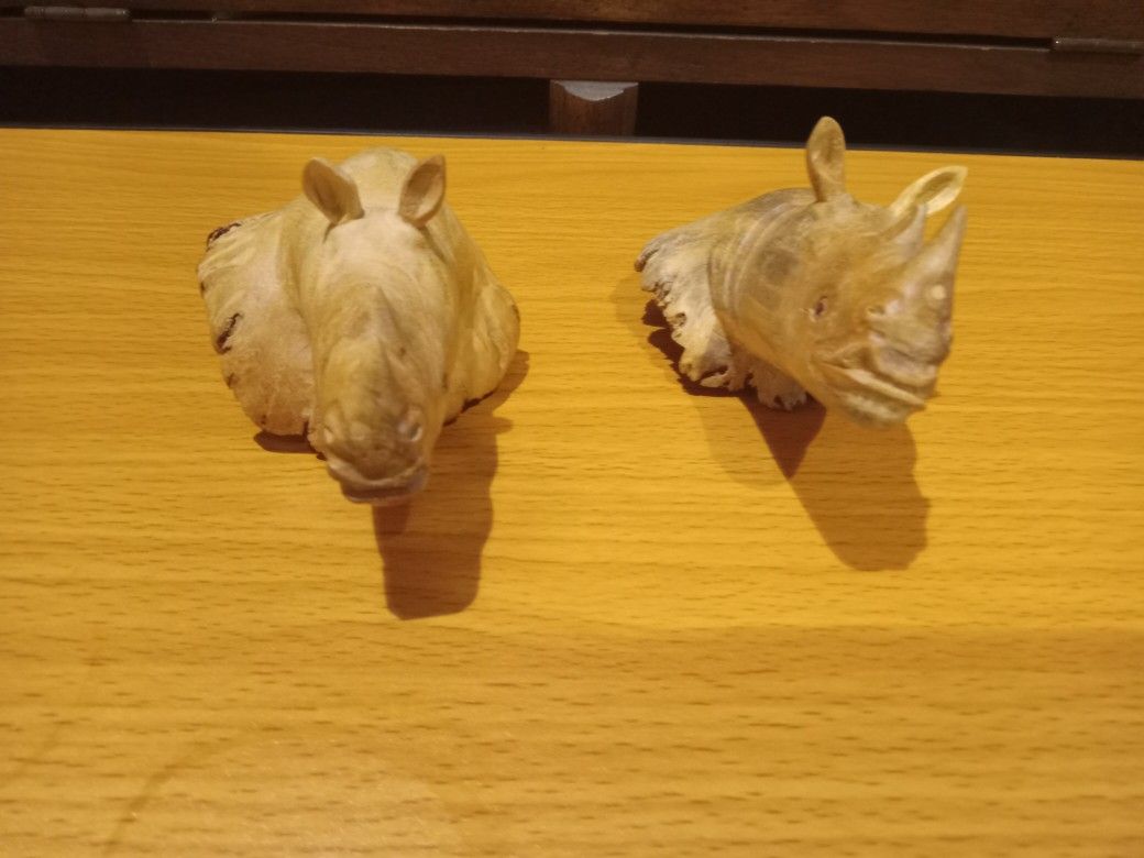Pair Of Hand Carved Rhino's From Tree Stump