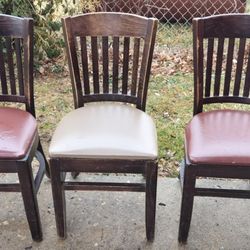 3 wooden chairs