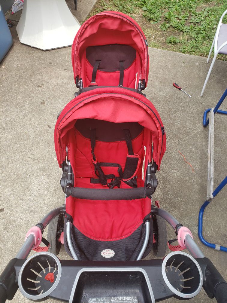 Double seated stroller , carseat and bass