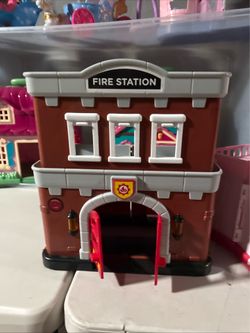 Members mark fire house