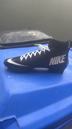 Never worn before Size 14 cleats