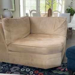 Pottery Barn brown suede corner chair