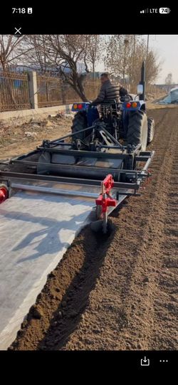 Farm ridge making with plastic mulch liner machine