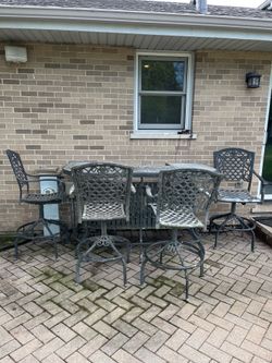 Outdoor bar and stools