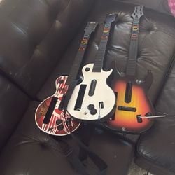 Nintendo Wii With 3 Guitar Hero Guitars 