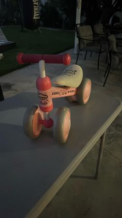 Pink duck tricycle