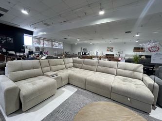 Beige 7pc Sliding Sectional w/ Storage Chaise