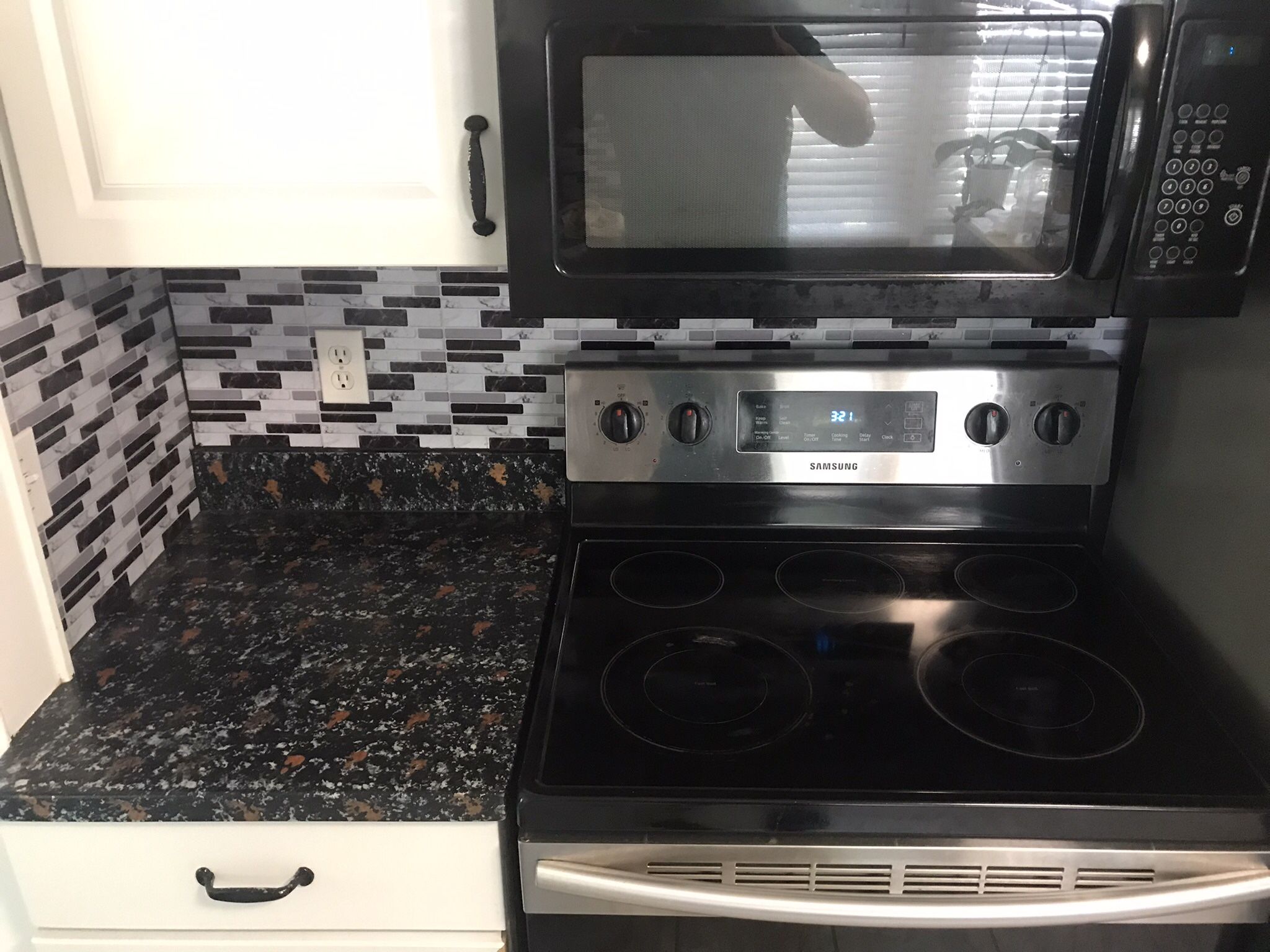 microwave 100$ Over The Range microwave